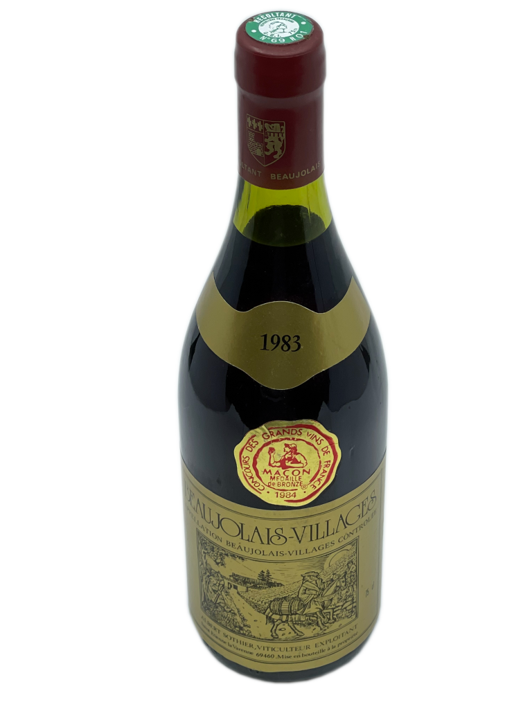 Beaujolais village nouveau élevé savoir faire tradition cuvée terroir domaine vin rouge garde structuré fraîcheur fruité cépage gamay caractéristique millésime robe pourpre nuance violacée nez bouche aromatique arômes fruits rouges ronde fraîche joli tanin fin compotée fruits cuits âge médaille bronze concours grands vins mâcon